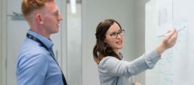 project managers discussing a communication plan