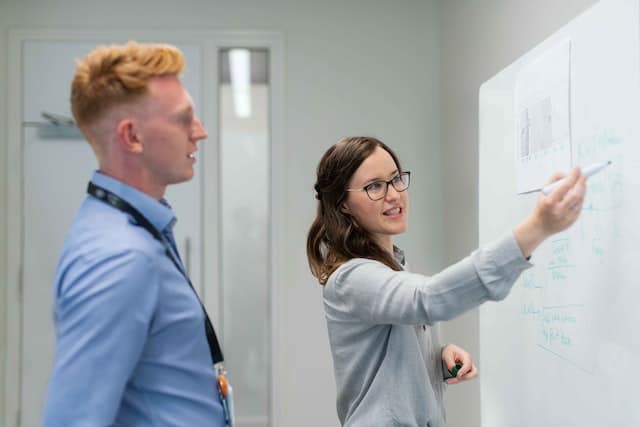 project managers discussing a communication plan
